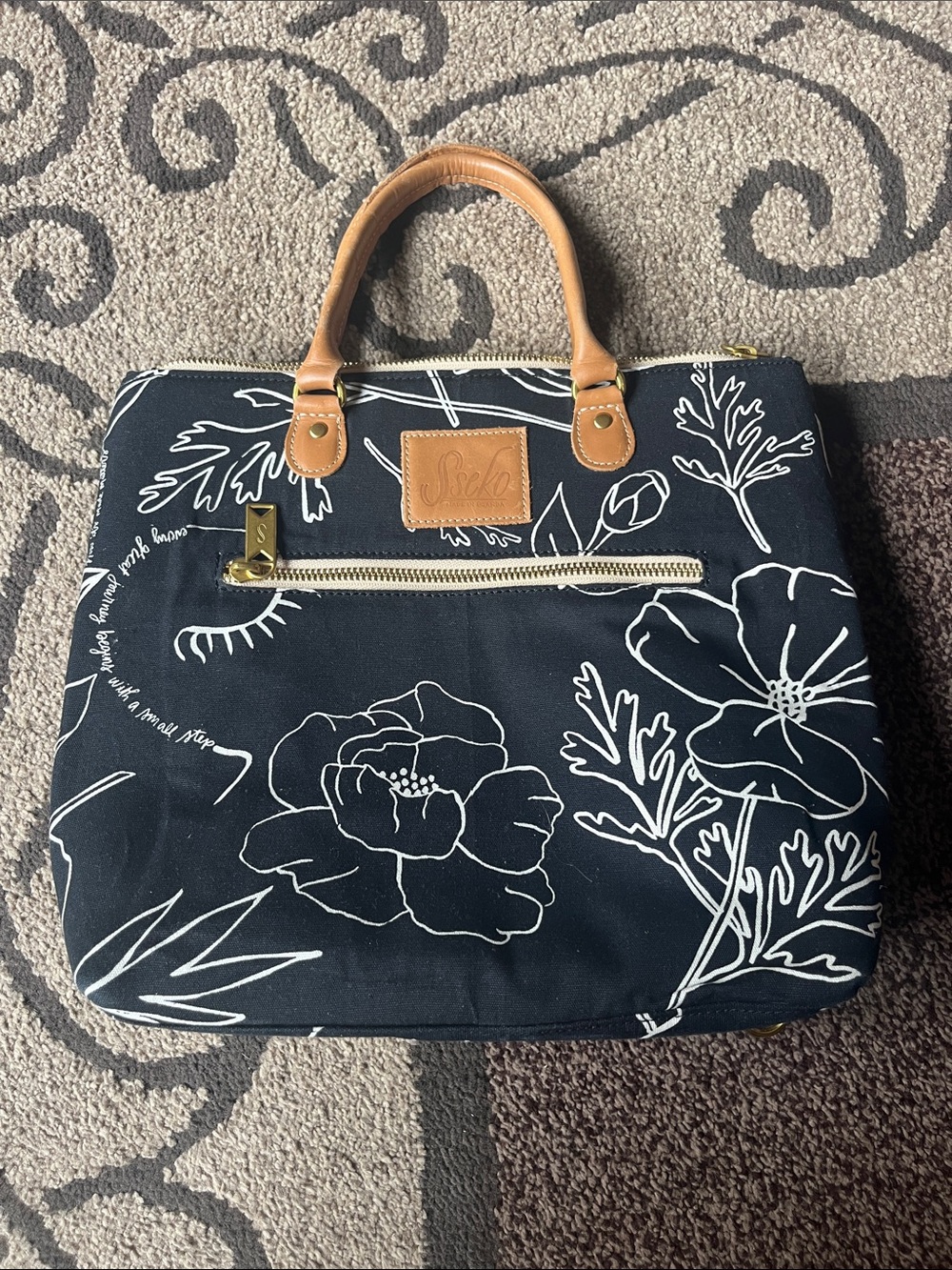 Sseko Black Canvas Tote with White Floral Print and Tan Leather Handles